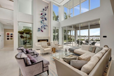 Experience the best of luxury living in this waterfront coastal on Sailfish Point Golf Club, Inc. in Florida - for sale on GolfHomes.com, golf home, golf lot