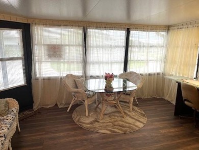 Welcome to your perfect seasonal escape! This 2-bedroom on Crystal Lake Club in Florida - for sale on GolfHomes.com, golf home, golf lot