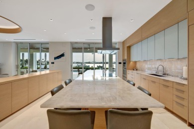 Experience the best of luxury living in this waterfront coastal on Sailfish Point Golf Club, Inc. in Florida - for sale on GolfHomes.com, golf home, golf lot