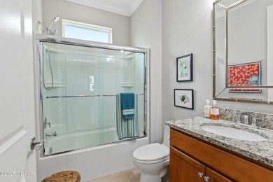 Welcome to Perfection in Paradise! This amazing Parrot model is on LPGA International Golf Course in Florida - for sale on GolfHomes.com, golf home, golf lot