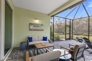Welcome to Perfection in Paradise! This amazing Parrot model is on LPGA International Golf Course in Florida - for sale on GolfHomes.com, golf home, golf lot