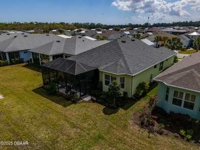 Welcome to Perfection in Paradise! This amazing Parrot model is on LPGA International Golf Course in Florida - for sale on GolfHomes.com, golf home, golf lot