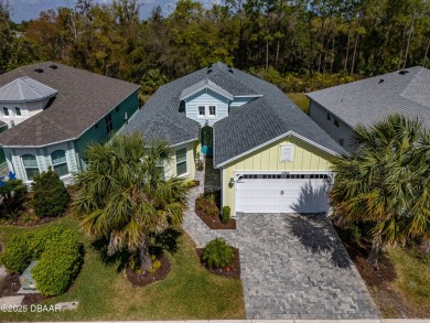Welcome to Perfection in Paradise! This amazing Parrot model is on LPGA International Golf Course in Florida - for sale on GolfHomes.com, golf home, golf lot