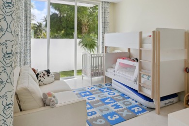 Experience the best of luxury living in this waterfront coastal on Sailfish Point Golf Club, Inc. in Florida - for sale on GolfHomes.com, golf home, golf lot