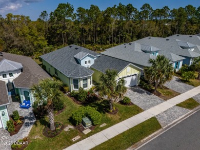 Welcome to Perfection in Paradise! This amazing Parrot model is on LPGA International Golf Course in Florida - for sale on GolfHomes.com, golf home, golf lot
