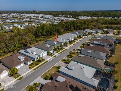 Welcome to Perfection in Paradise! This amazing Parrot model is on LPGA International Golf Course in Florida - for sale on GolfHomes.com, golf home, golf lot