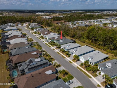 Welcome to Perfection in Paradise! This amazing Parrot model is on LPGA International Golf Course in Florida - for sale on GolfHomes.com, golf home, golf lot