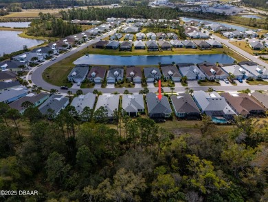Welcome to Perfection in Paradise! This amazing Parrot model is on LPGA International Golf Course in Florida - for sale on GolfHomes.com, golf home, golf lot