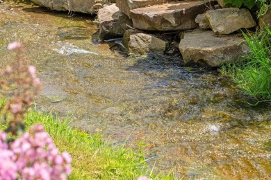 This fully furnished 2-bedroom, 2-bath condo offers a on Pointe Royale Village Country Club in Missouri - for sale on GolfHomes.com, golf home, golf lot