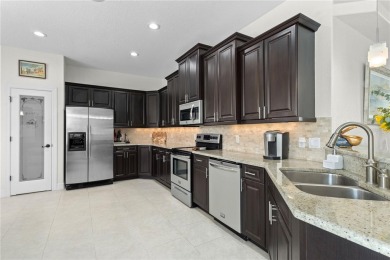If you're looking for spectacular manicured views on a golf on Saint Andrews South Golf Club in Florida - for sale on GolfHomes.com, golf home, golf lot