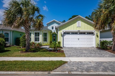 Welcome to Perfection in Paradise! This amazing Parrot model is on LPGA International Golf Course in Florida - for sale on GolfHomes.com, golf home, golf lot