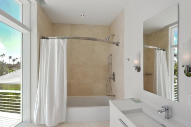 Experience the best of luxury living in this waterfront coastal on Sailfish Point Golf Club, Inc. in Florida - for sale on GolfHomes.com, golf home, golf lot