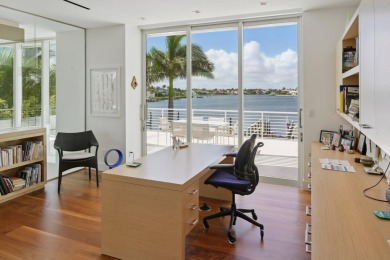 Experience the best of luxury living in this waterfront coastal on Sailfish Point Golf Club, Inc. in Florida - for sale on GolfHomes.com, golf home, golf lot