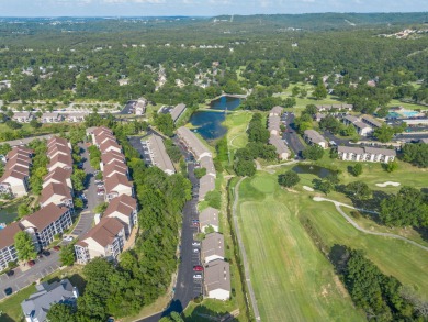 This fully furnished 2-bedroom, 2-bath condo offers a on Pointe Royale Village Country Club in Missouri - for sale on GolfHomes.com, golf home, golf lot