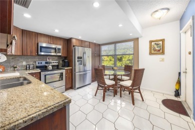 Motivated Seller!  Beautifully updated 2-bed, 2-bath corner unit on Wynmoor Golf Course in Florida - for sale on GolfHomes.com, golf home, golf lot