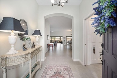 ~GOLF COURSE AND WATER VIEW~ ~ROOM FOR A POOL~ ~GLASS ENCLOSED on Pennbrooke Fairways in Florida - for sale on GolfHomes.com, golf home, golf lot