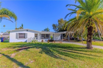 This gorgeous 4 bedroom, 2 bath pool home in the historic Palm on Fort Myers Country Club in Florida - for sale on GolfHomes.com, golf home, golf lot