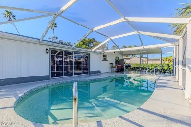 This gorgeous 4 bedroom, 2 bath pool home in the historic Palm on Fort Myers Country Club in Florida - for sale on GolfHomes.com, golf home, golf lot