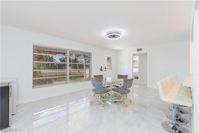This gorgeous 4 bedroom, 2 bath pool home in the historic Palm on Fort Myers Country Club in Florida - for sale on GolfHomes.com, golf home, golf lot