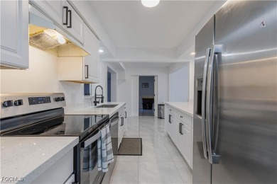 This gorgeous 4 bedroom, 2 bath pool home in the historic Palm on Fort Myers Country Club in Florida - for sale on GolfHomes.com, golf home, golf lot