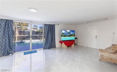 This gorgeous 4 bedroom, 2 bath pool home in the historic Palm on Fort Myers Country Club in Florida - for sale on GolfHomes.com, golf home, golf lot