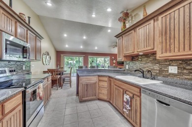 Enjoy golf course living in this beautifully maintained on Indian Hills Golf Club in Iowa - for sale on GolfHomes.com, golf home, golf lot