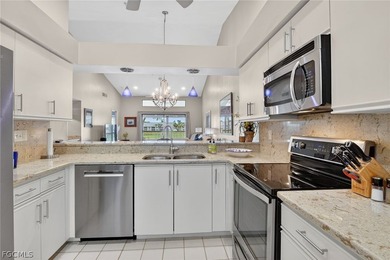 Quiet end-unit offering privacy and natural light throughout on  in Florida - for sale on GolfHomes.com, golf home, golf lot