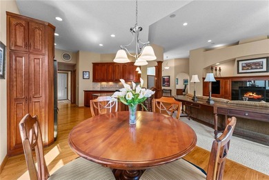 Experience the best of one-level living with peaceful lake views on TPC of the Twin Cities in Minnesota - for sale on GolfHomes.com, golf home, golf lot