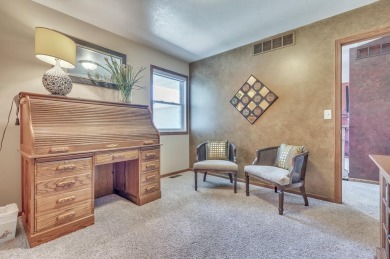 Enjoy golf course living in this beautifully maintained on Indian Hills Golf Club in Iowa - for sale on GolfHomes.com, golf home, golf lot