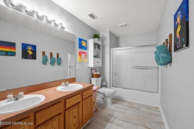 This beautiful 4-bedroom, 2-bathroom home in the peaceful on King and Bear Golf Course/World Golf Village in Florida - for sale on GolfHomes.com, golf home, golf lot