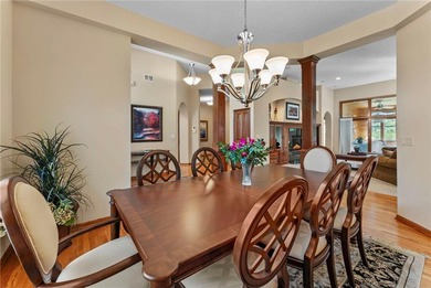 Experience the best of one-level living with peaceful lake views on TPC of the Twin Cities in Minnesota - for sale on GolfHomes.com, golf home, golf lot