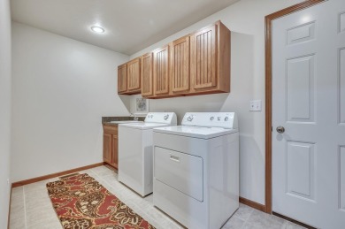 Enjoy golf course living in this beautifully maintained on Indian Hills Golf Club in Iowa - for sale on GolfHomes.com, golf home, golf lot