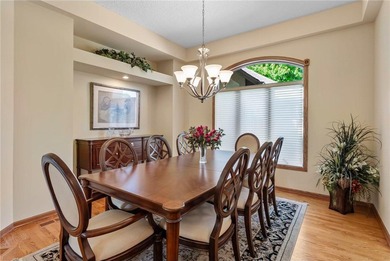 Experience the best of one-level living with peaceful lake views on TPC of the Twin Cities in Minnesota - for sale on GolfHomes.com, golf home, golf lot