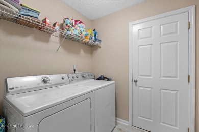 This beautiful 4-bedroom, 2-bathroom home in the peaceful on King and Bear Golf Course/World Golf Village in Florida - for sale on GolfHomes.com, golf home, golf lot