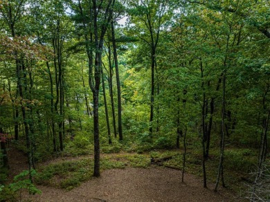 Discover the best of mountain living at 108 Uplands, an on High Hampton Inn and Country Club in North Carolina - for sale on GolfHomes.com, golf home, golf lot