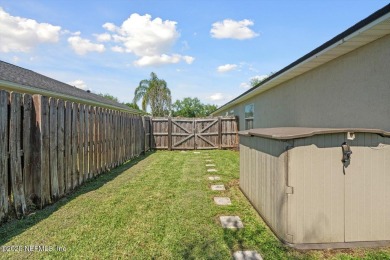 This beautiful 4-bedroom, 2-bathroom home in the peaceful on King and Bear Golf Course/World Golf Village in Florida - for sale on GolfHomes.com, golf home, golf lot