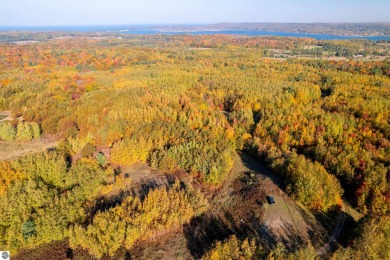 This pristine, rolling wooded land with abundant wildlife on The Heathlands in Michigan - for sale on GolfHomes.com, golf home, golf lot