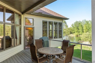 Experience the best of one-level living with peaceful lake views on TPC of the Twin Cities in Minnesota - for sale on GolfHomes.com, golf home, golf lot