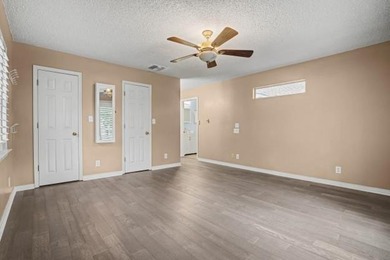 This wonderfully Eclectic Cottage is nestled next to dunes in on Isle Dauphine Club Golf Course in Alabama - for sale on GolfHomes.com, golf home, golf lot