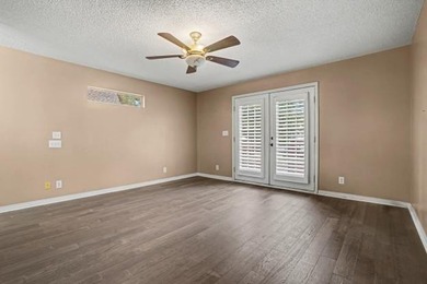 This wonderfully Eclectic Cottage is nestled next to dunes in on Isle Dauphine Club Golf Course in Alabama - for sale on GolfHomes.com, golf home, golf lot