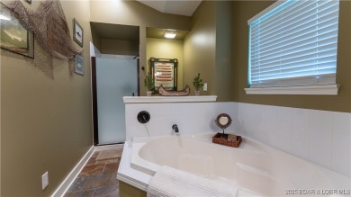 Nestled within the sought after community of Old Kinderhook on The Club At Old Kinderhook in Missouri - for sale on GolfHomes.com, golf home, golf lot