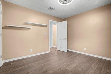 This wonderfully Eclectic Cottage is nestled next to dunes in on Isle Dauphine Club Golf Course in Alabama - for sale on GolfHomes.com, golf home, golf lot