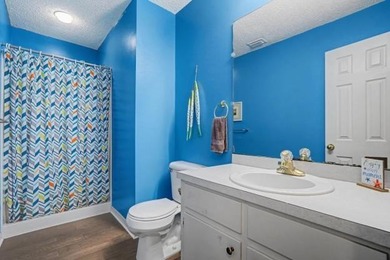 This wonderfully Eclectic Cottage is nestled next to dunes in on Isle Dauphine Club Golf Course in Alabama - for sale on GolfHomes.com, golf home, golf lot