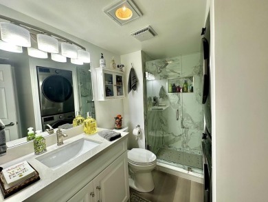 Welcome to this beautifully renovated corner unit, nestled in on Boca Lago Golf and Country Club in Florida - for sale on GolfHomes.com, golf home, golf lot