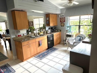 Welcome home to your single-story home with double garage on a on Atlantic National Golf and Country Club in Florida - for sale on GolfHomes.com, golf home, golf lot