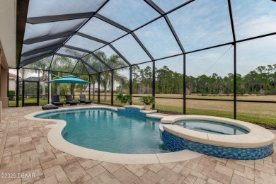 Modern elegance meets serene golf course views in this like-new on Venetian Bay Golf Course in Florida - for sale on GolfHomes.com, golf home, golf lot