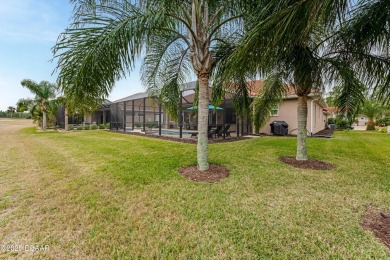 Modern elegance meets serene golf course views in this like-new on Venetian Bay Golf Course in Florida - for sale on GolfHomes.com, golf home, golf lot