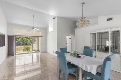 LOWEST-PRICED HOME IN RIVIERA GOLF ESTATES! Nestled within this on Riviera Golf Club in Florida - for sale on GolfHomes.com, golf home, golf lot