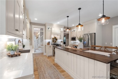 This fully remodeled home offers the perfect blend of privacy on Osage National Golf Club in Missouri - for sale on GolfHomes.com, golf home, golf lot