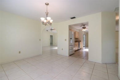 CHARMING 2 Bedroom, 2 Bathroom, 2 Car Garage, Pool home with a on Deep Creek Golf Club in Florida - for sale on GolfHomes.com, golf home, golf lot